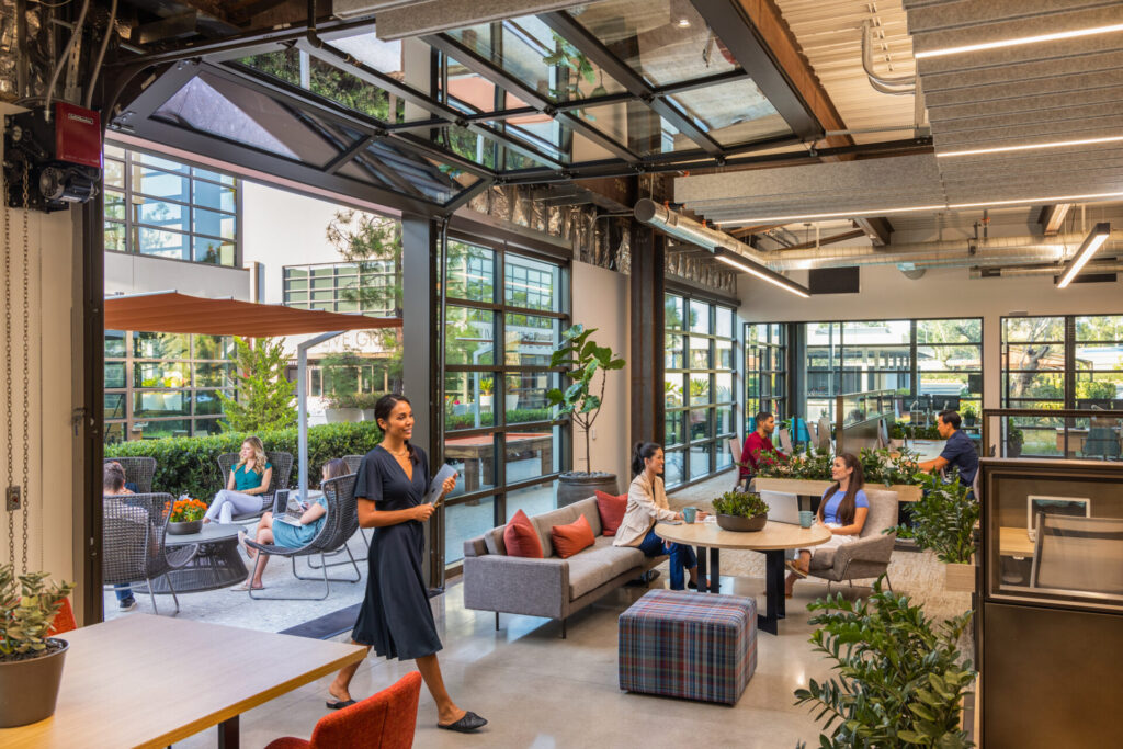People in open space office working
