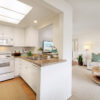 View of the kitchen and living room of an apartment home