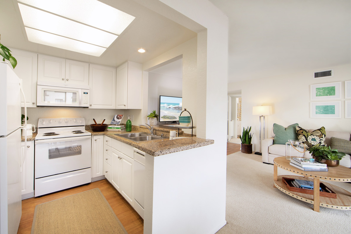 View of the kitchen and living room of an apartment home
