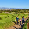 Family hiking through Irvine trail