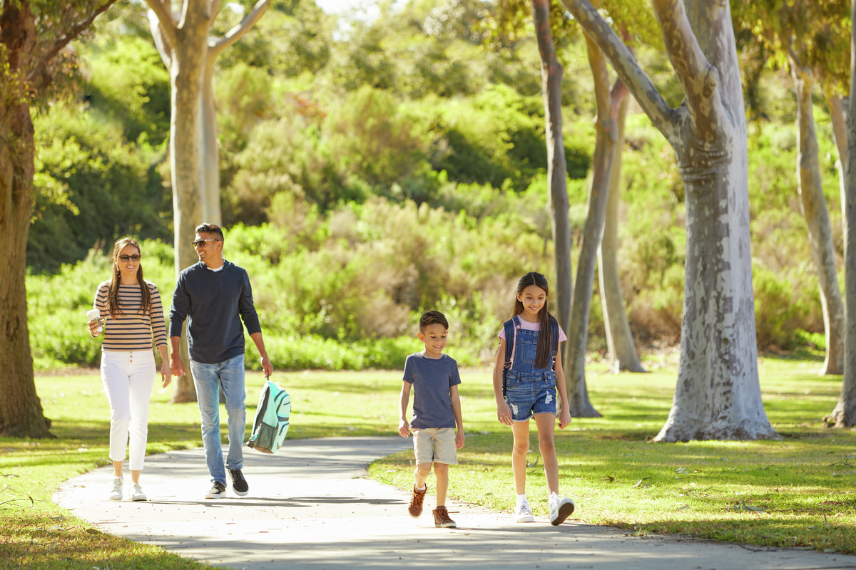 Photo of family walking through William Mason Park.